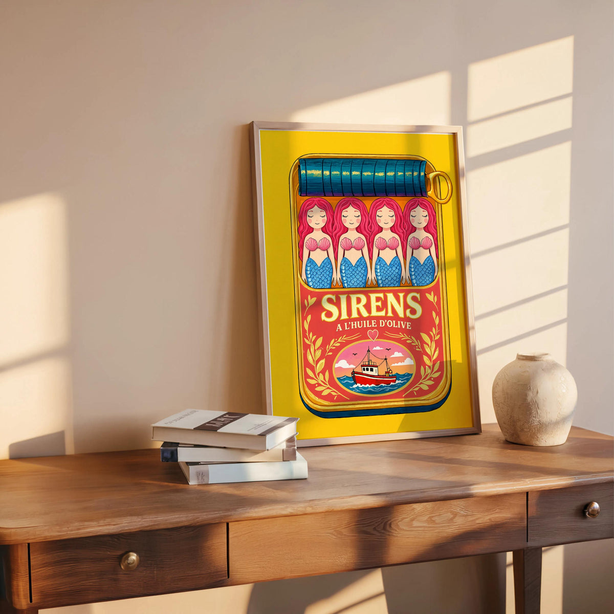 Yellow-framed siren sardine can print leaning on rustic table, bold colors, retro seafood wall art charm