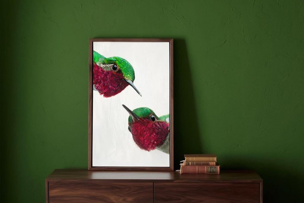 Whimsical hummingbird wall art print on console, emerald green wall backdrop, bold mid century modern bird art.