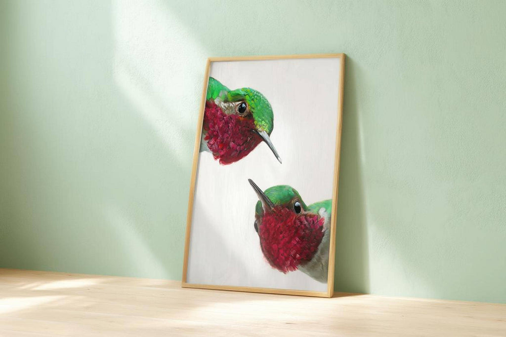 Whimsical hummingbird wall art print leaning on mint wall, visible brush texture, colorful hummingbird poster charm.