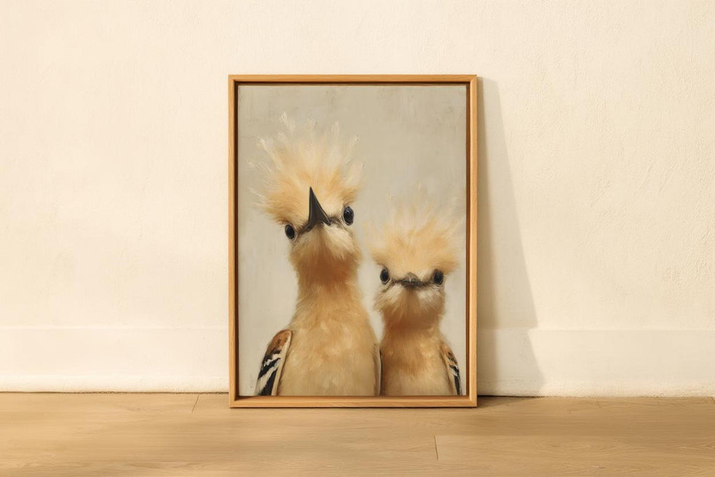 Light wood-framed whimsical bird nursery wall art leaning on a shelf, soft beige backdrop, humorous peeking hoopoes and texture.