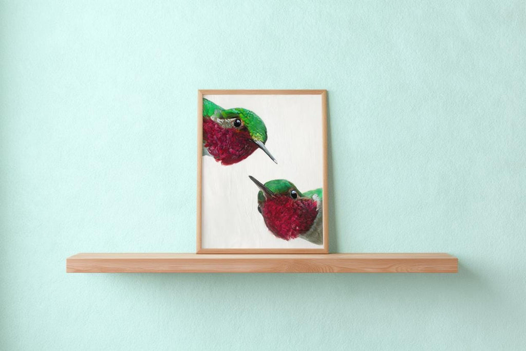 Seafoam wall and light shelf display whimsical hummingbird wall art print, bright tropical bird artwork with clean white background.