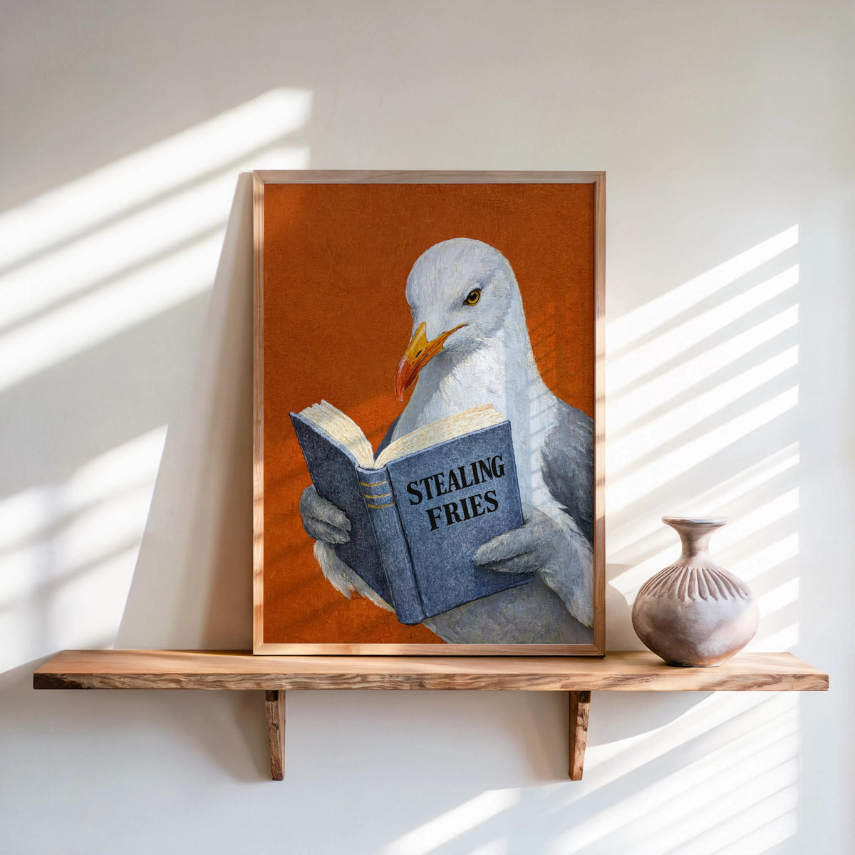 Framed textured orange background, seagull reading blue book on shelf, funny seagull reading art print