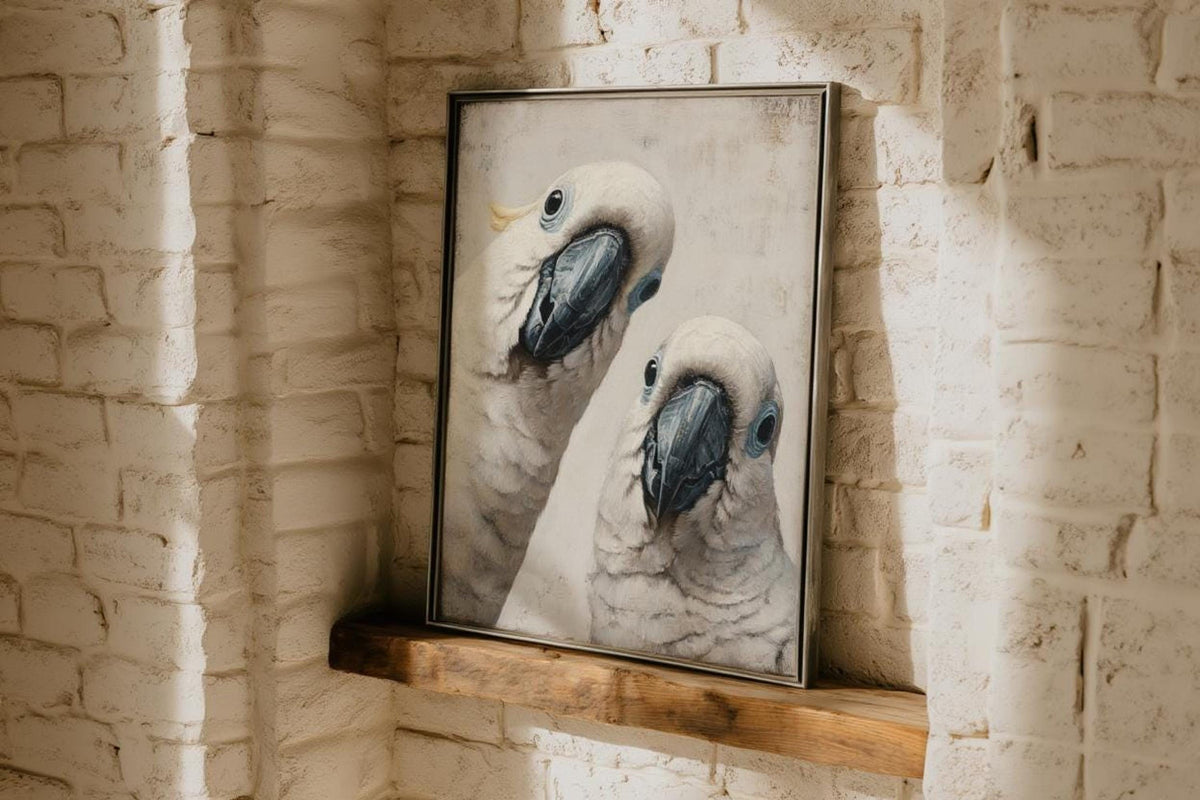 White cockatoo wall art leaning in a textured alcove, Australian bird art print with soft yellow crest accents