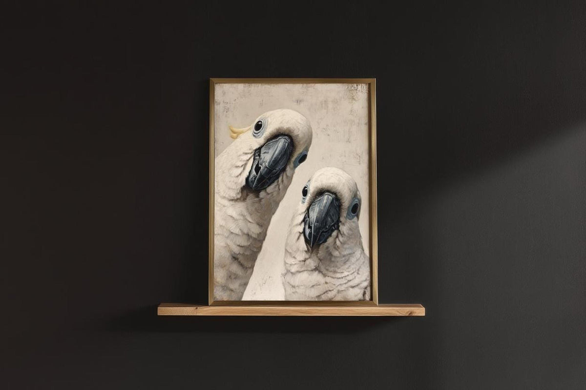 Framed funny cockatoo art print on a thin shelf against a dark wall, minimalist bird wall decor with humor