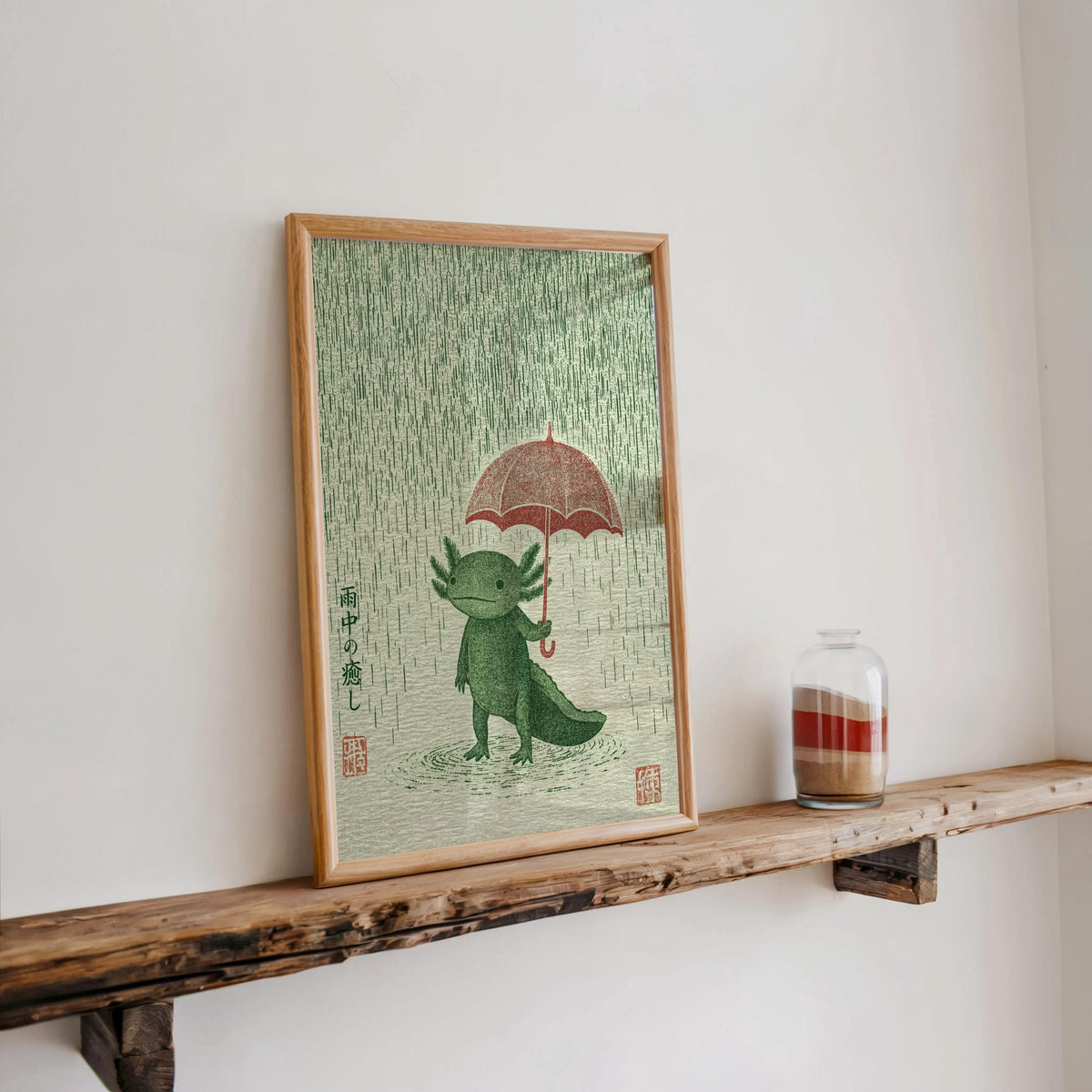 Small framed Axolotl Wall Art Print on a narrow floating shelf, simple styling, axolotl umbrella art focal point