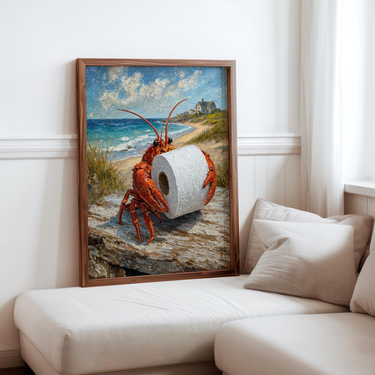 Framed funny lobster bathroom print leaning by a beige sofa, beachy color palette, whimsical lobster toilet paper wall art