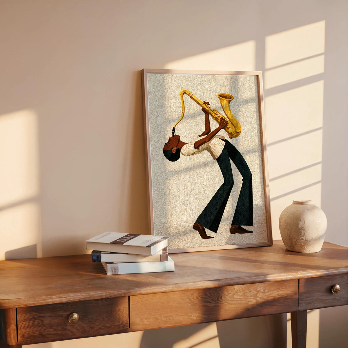 Afrocentric jazz wall art print on wooden desk, cream textured background, golden saxophone details visible.