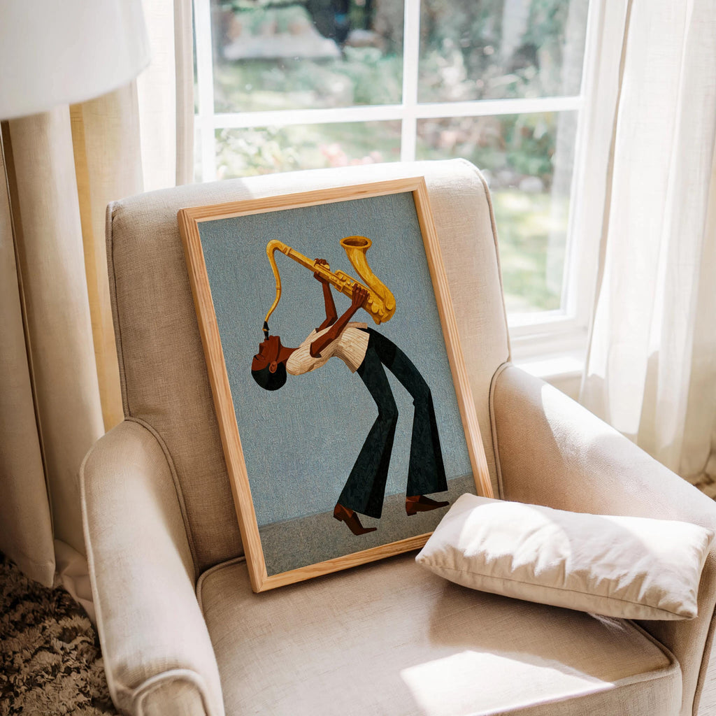Afrocentric jazz wall art print on cozy chair by window, cool blue background, framed poster look.
