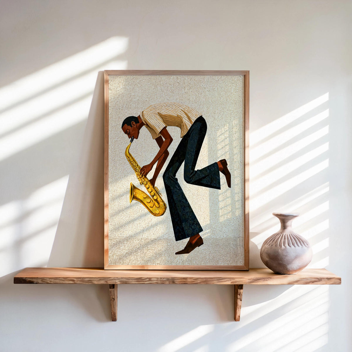 Cream toned mid century saxophone wall art propped on shelf, vintage jazz saxophonist print, soft morning light