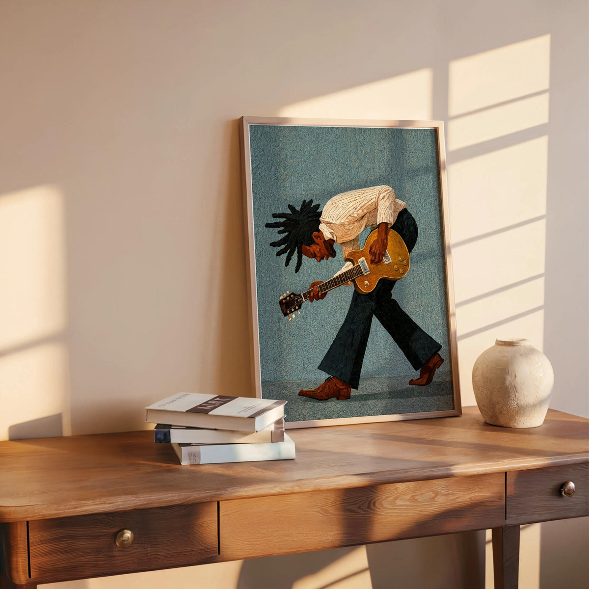 Blue print on wooden desk, bold retro graphic style visible, African American musician print, guitar detail
