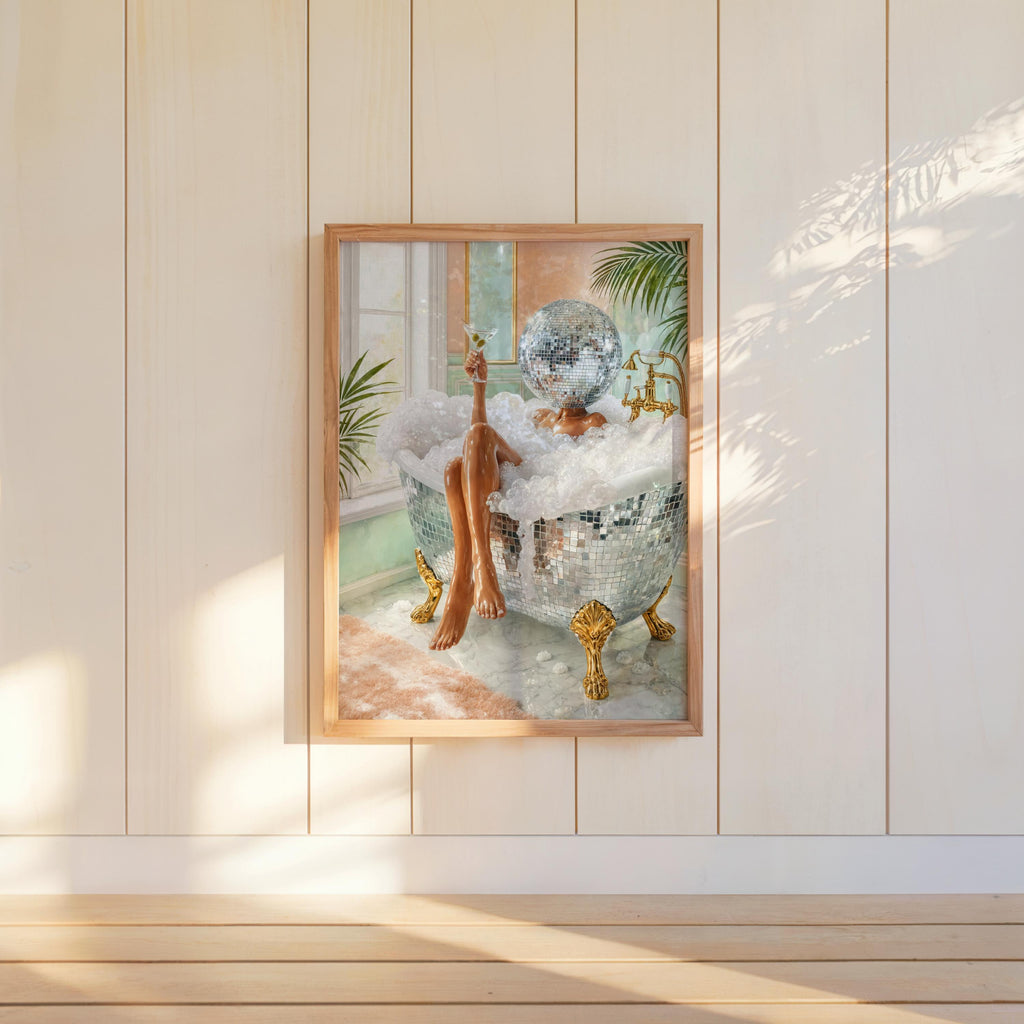 Maximalist bathroom decor feel, disco ball bathroom art print centered on white paneled wall, warm glow