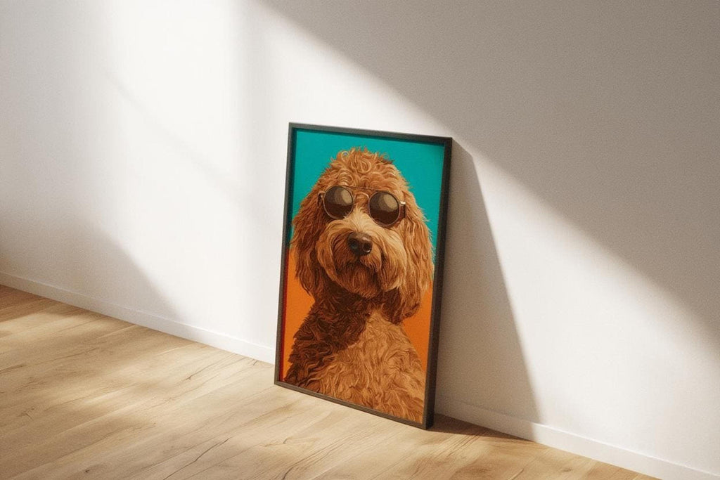Poster propped on a sunlit floor, goldendoodle pop art print showing round sunglasses and bold teal and orange.