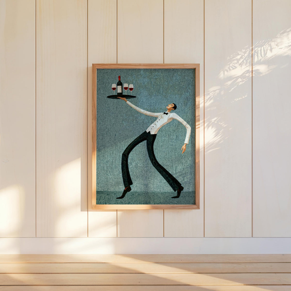 Teal wine waiter art print standing on floor beside paneled wall, stylized waiter balancing wine bottles, whimsical kitchen art