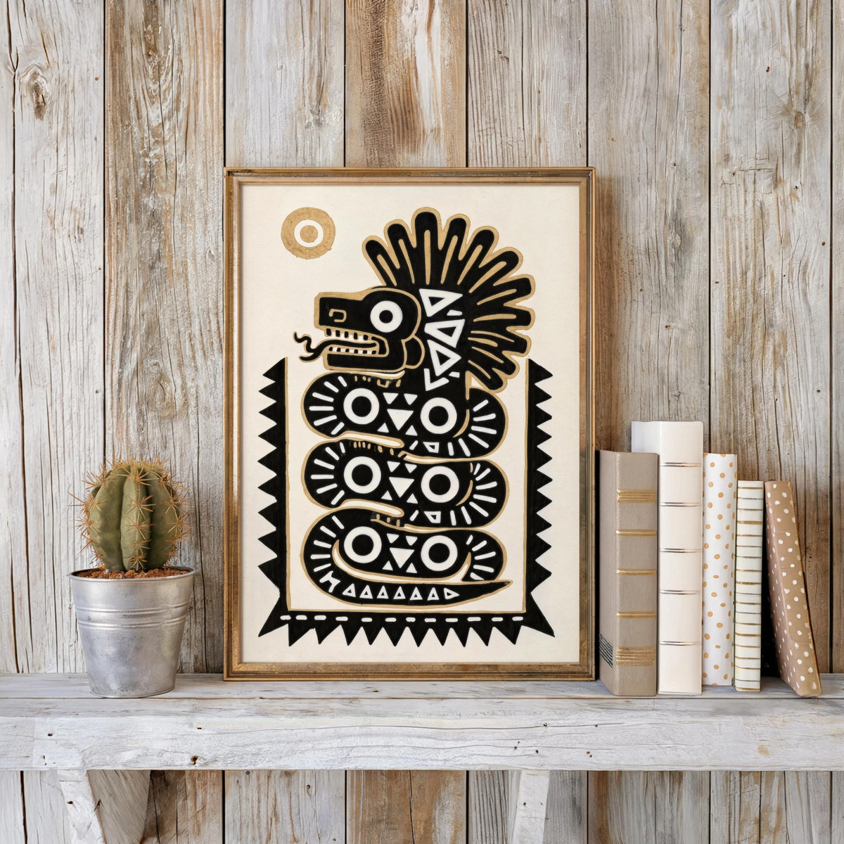 Rustic plank wall backdrop, framed mesoamerican mythology poster with succulent and stacked books for texture