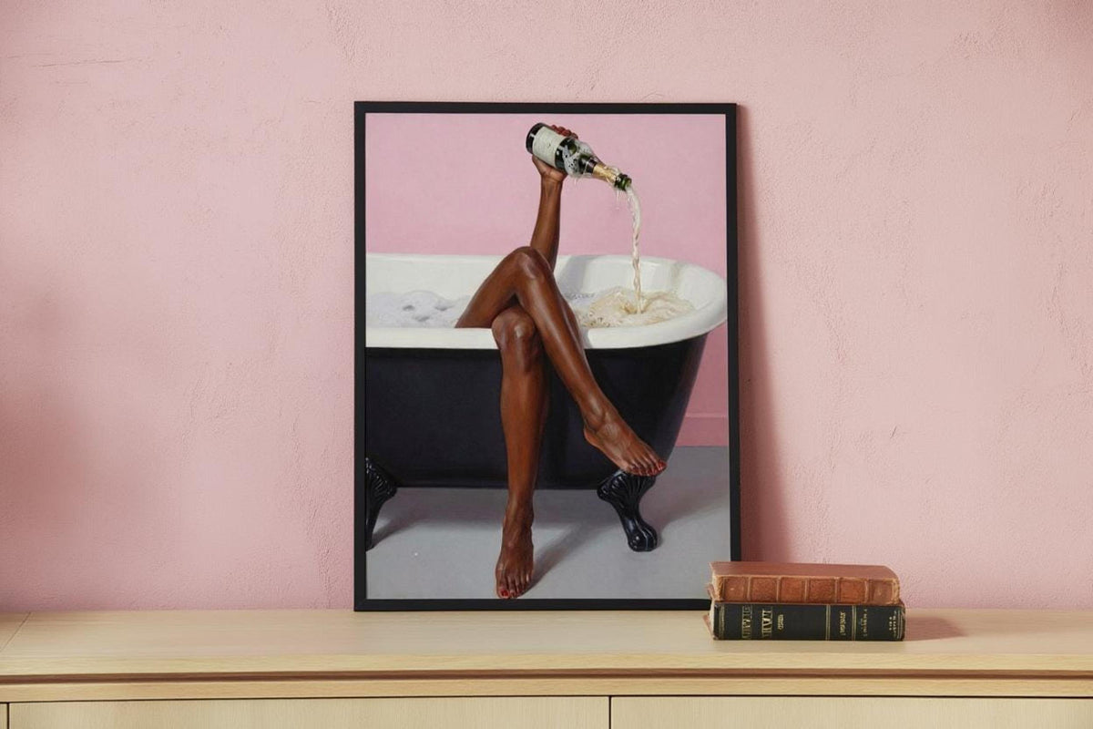 Print on a shelf beside a small book, funny champagne wall art touch, black woman bathroom wall art, playful spa tone