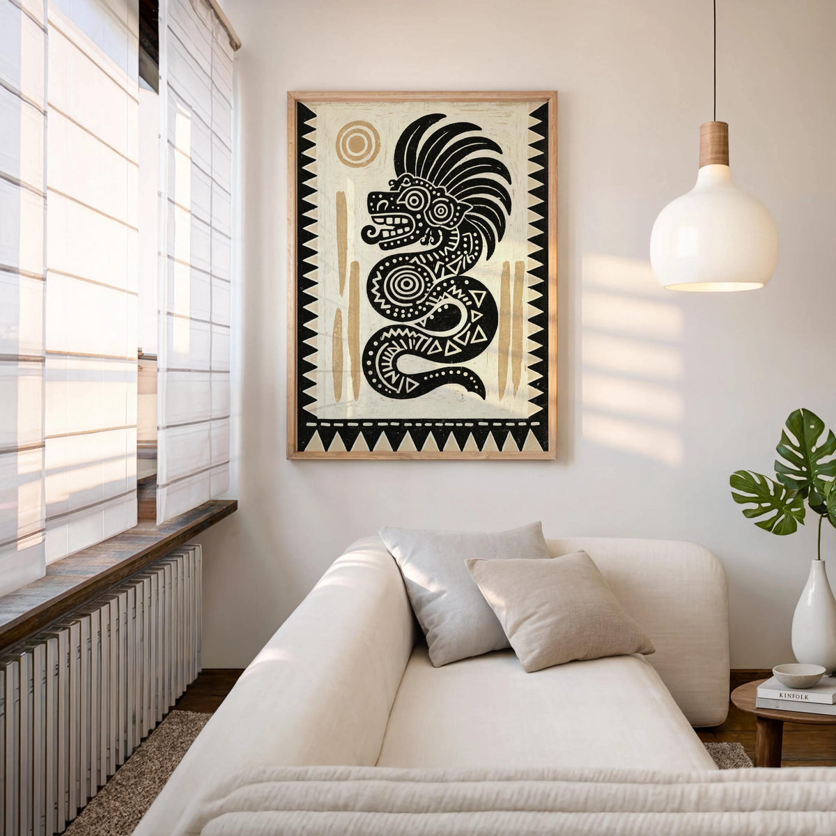 Aztec wall decor hung above a sofa, feathered serpent poster brings bold black-and-cream contrast to the living room.