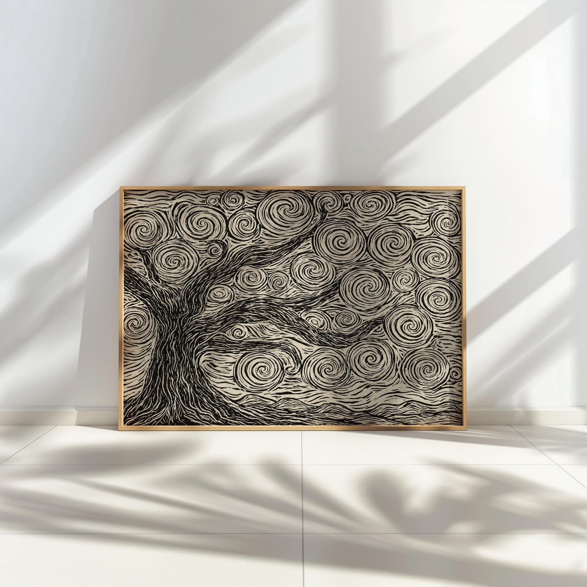 Framed linocut tree print propped against wall, bright window light casting stripes, neutral tree wall art