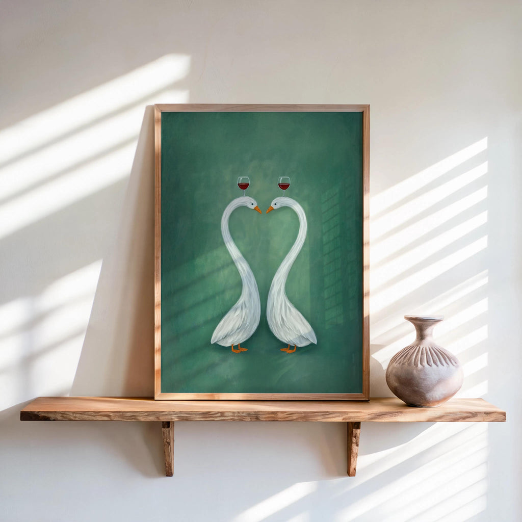 Framed green swan couple art print on shelf, elegant white swans forming a heart, modern minimalist texture