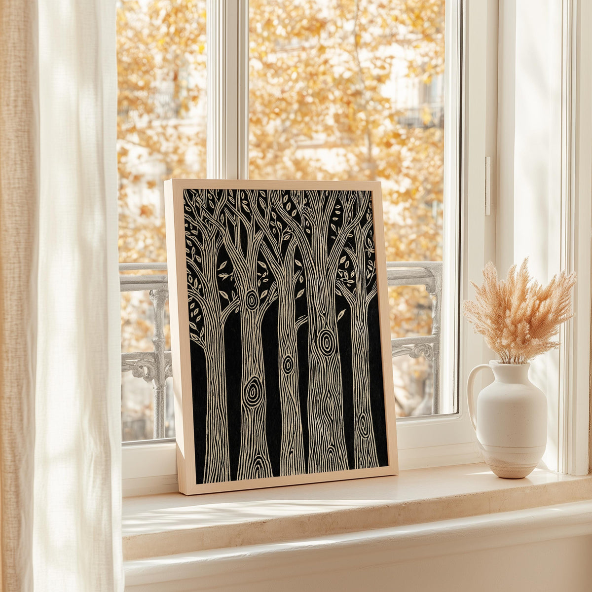 Black and white forest wall art set in a sunny window with autumn foliage outside, rustic cabin wall decor, monochrome nature print
