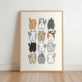 Wood-framed print leaning on floor, 3x4 watercolor cat butts in warm tones, funny cat butt bathroom wall art
