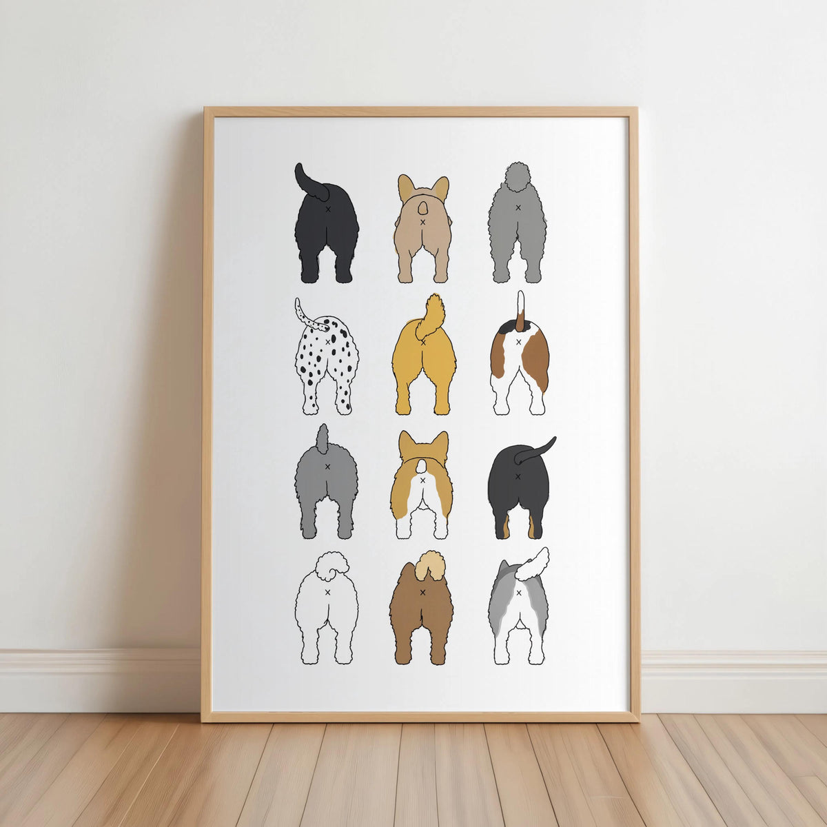 Framed print leaning on white wall, 3-by-4 grid of stylized dog backsides, minimalist dog butt bathroom wall art