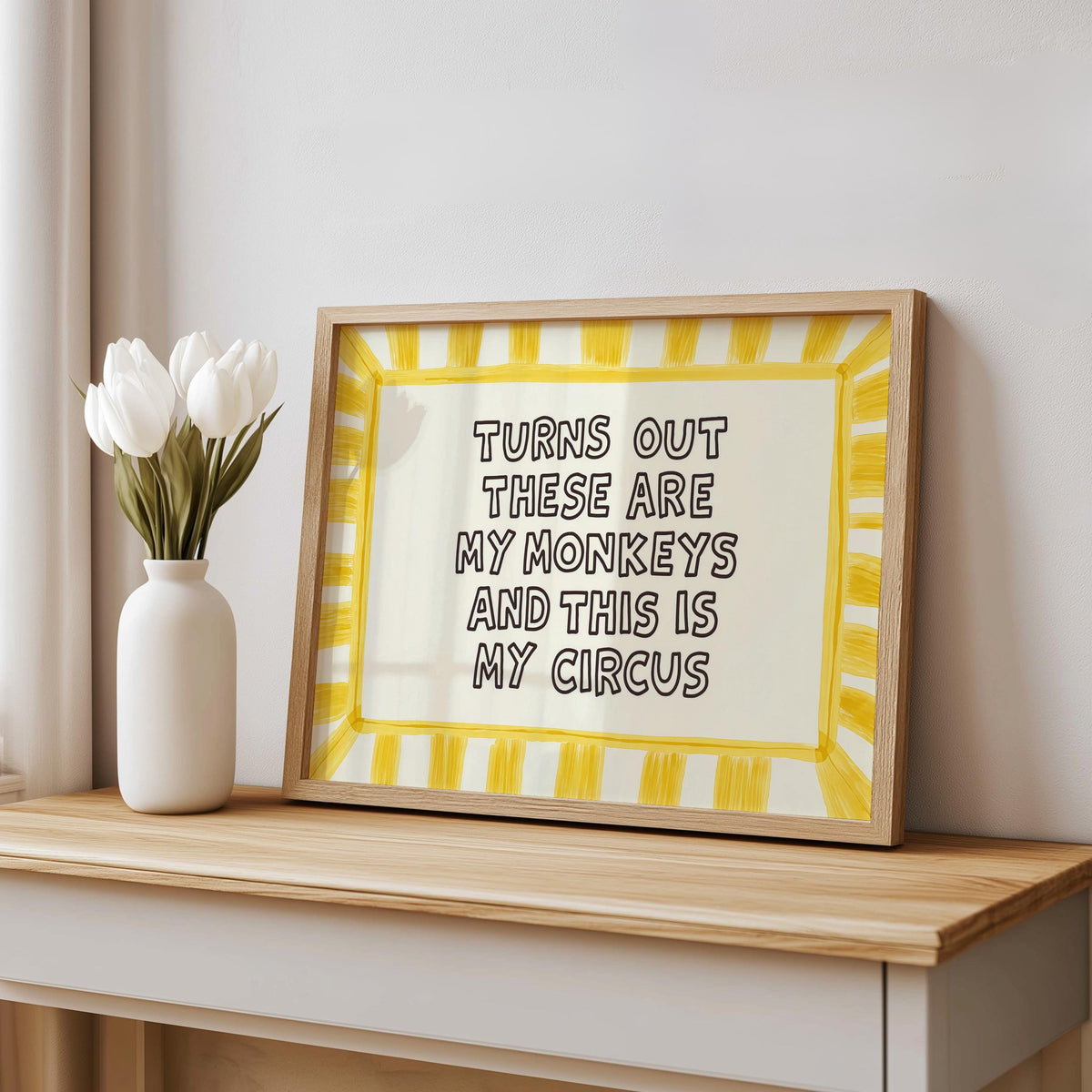 Styled shelf vignette, yellow striped framed print leaning on console with white vase, funny family wall decor, kitchen quote wall art.