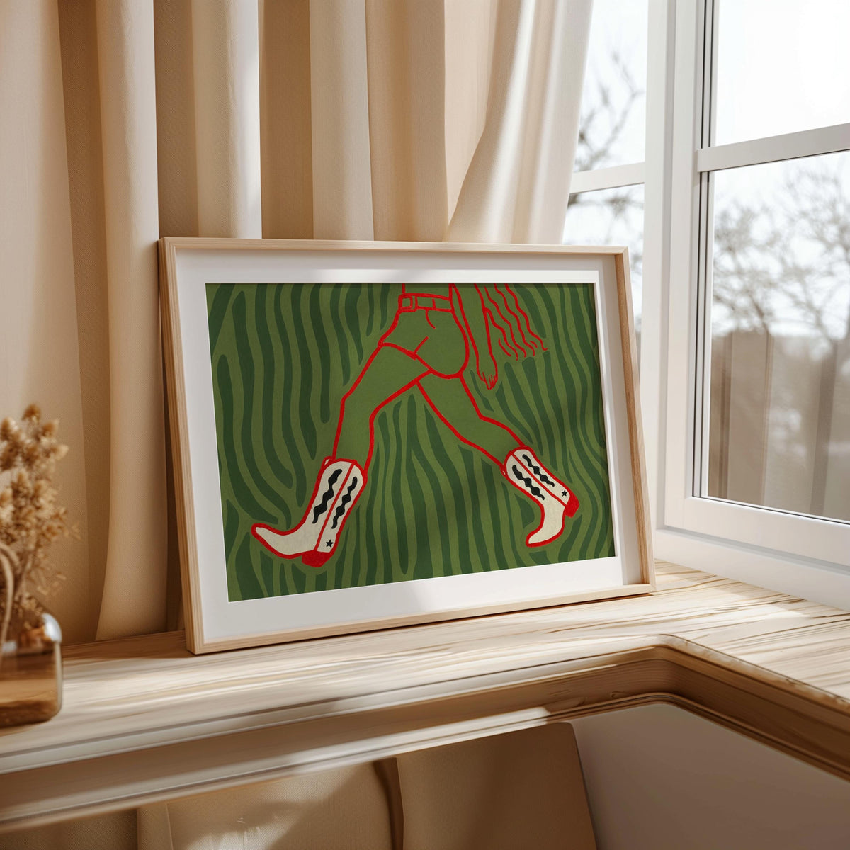Green zebra-style cowgirl wall art print on bright windowsill, natural light highlighting red cowgirl boots design