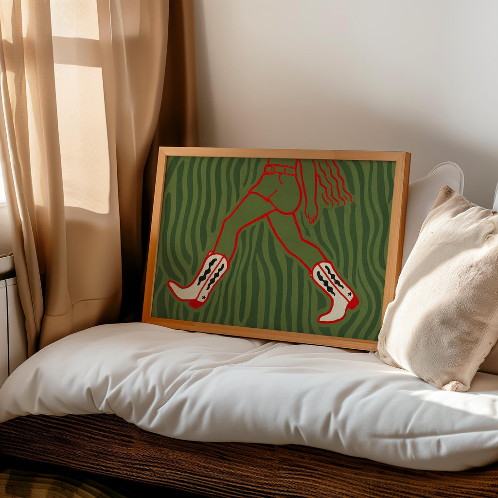 Green patterned cowgirl wall art print tucked on bedframe, western cowgirl wall art blending boho and retro style