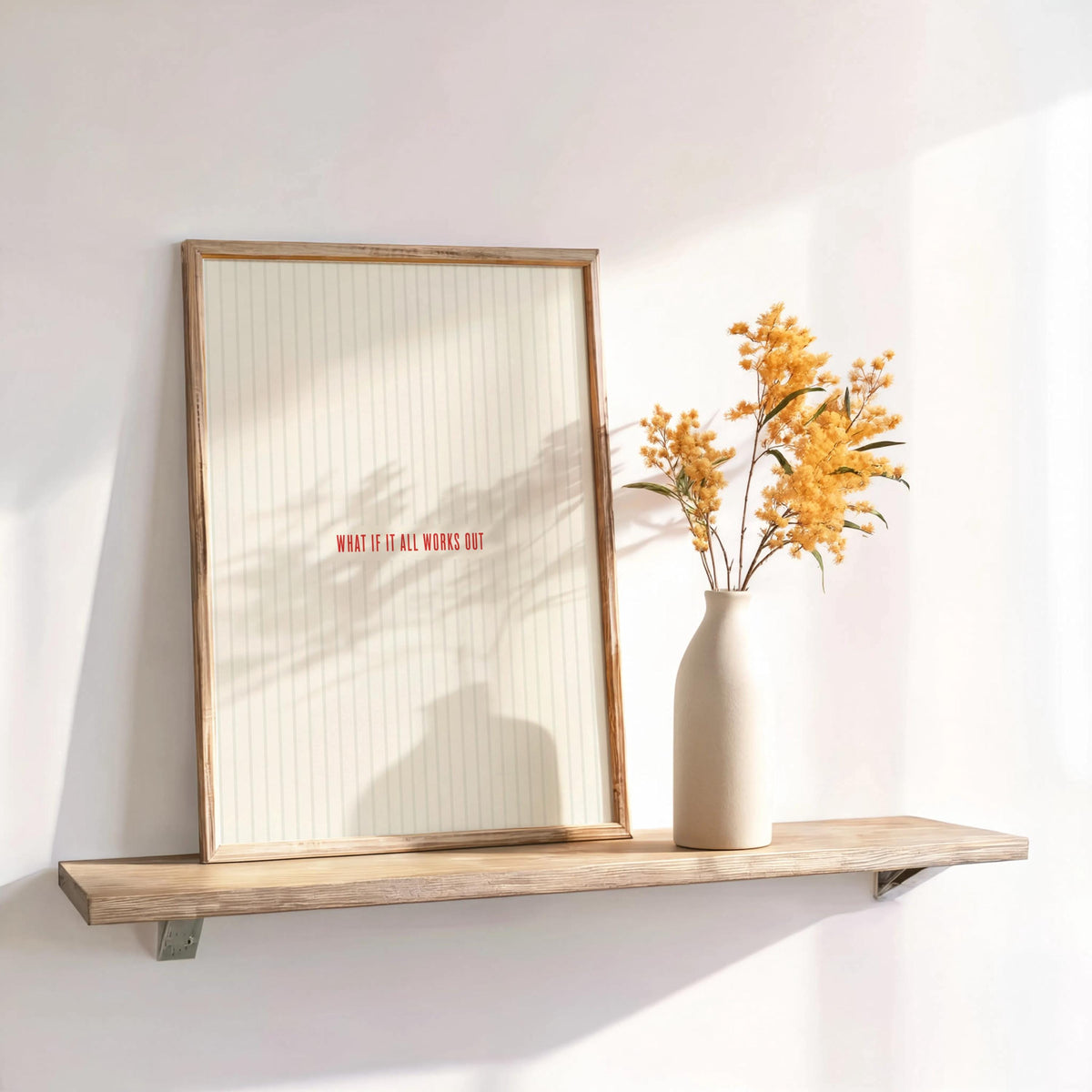 Minimalist what if it all works out wall art on a floating shelf, dried flowers, soft light