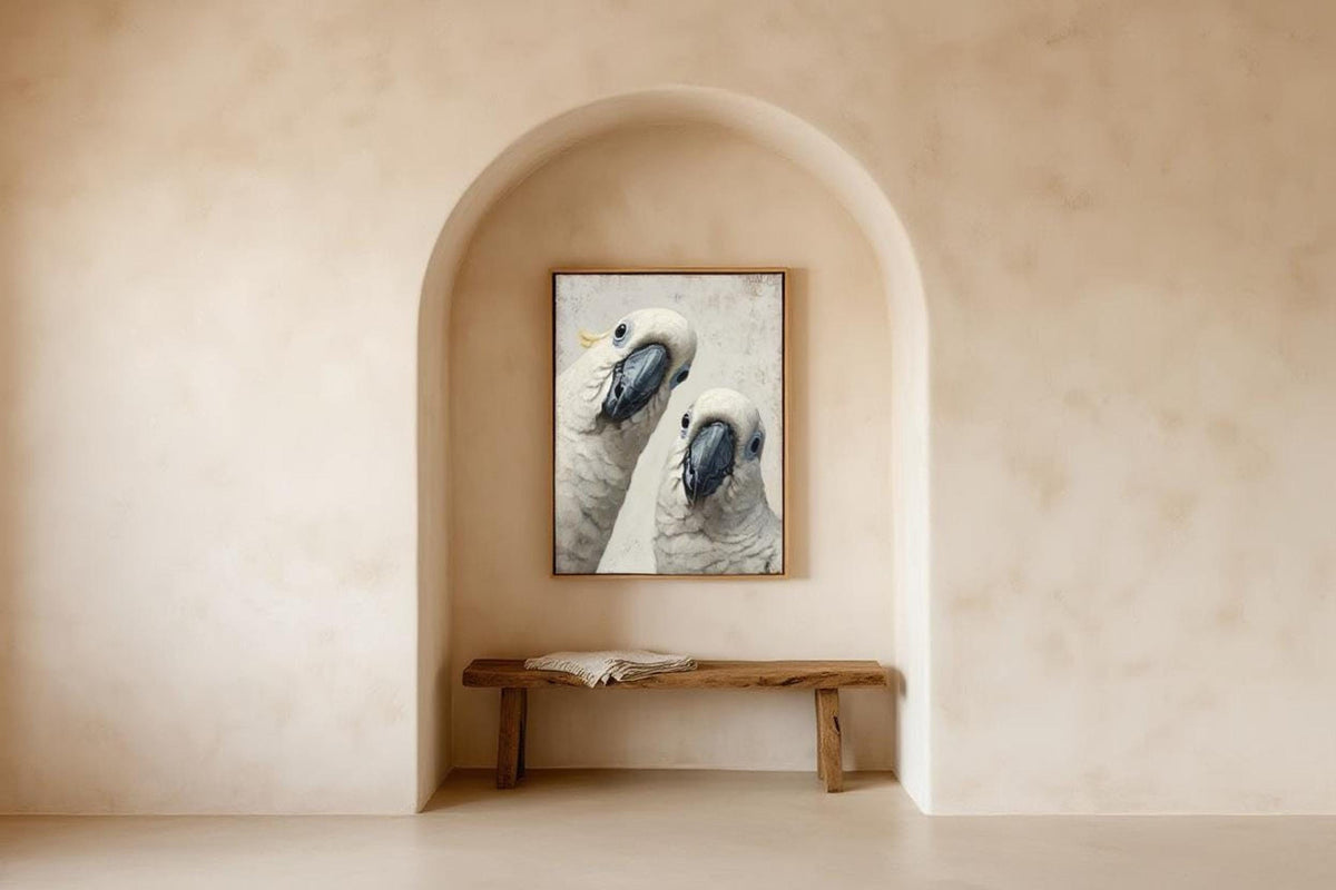 Peeking parrot wall art displayed in an arched niche, quirky bird wall art in a warm beige, Scandinavian style