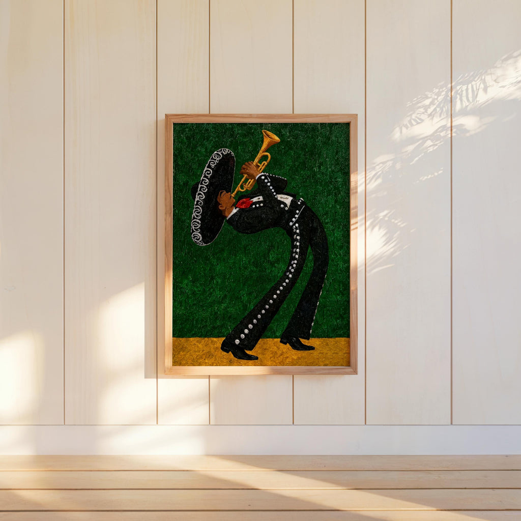 Emerald green mariachi wall art print hung on white panel, textured glitter background and gold lower band catching light