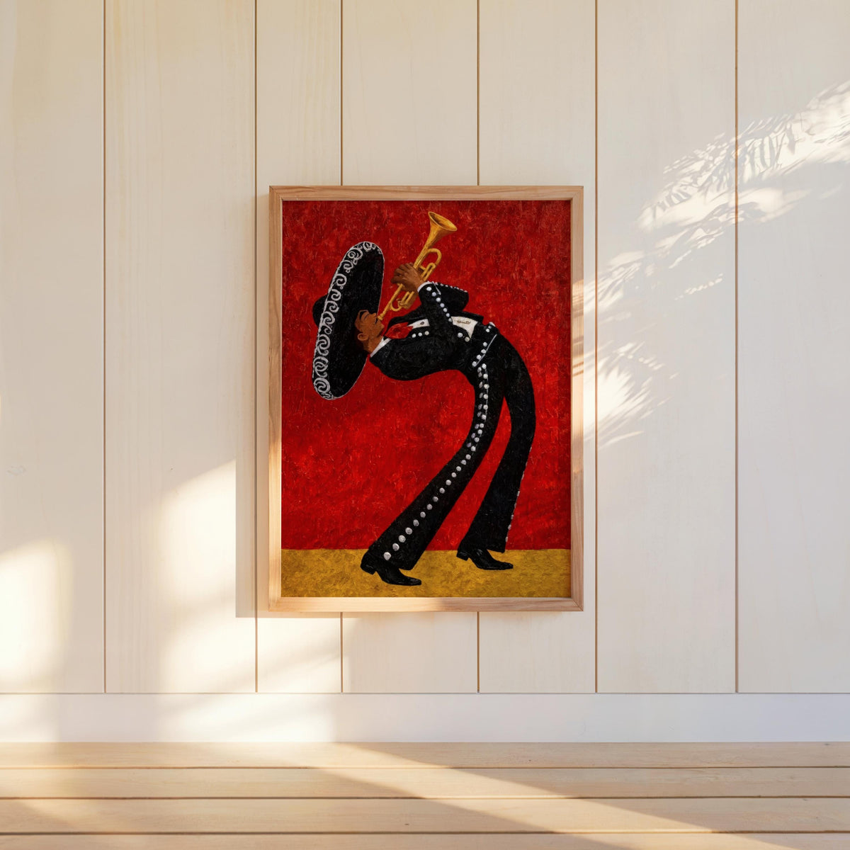 Red mariachi wall art print hung left above console, warm sunlight and shadows, bold modern Mexican home decor accent