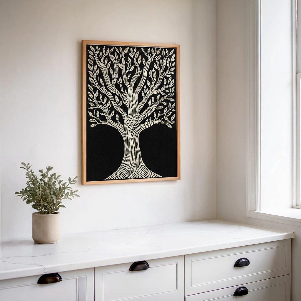 Tree of Life wall art above white counter, wood frame complements minimalist botanical print, small potted plant.