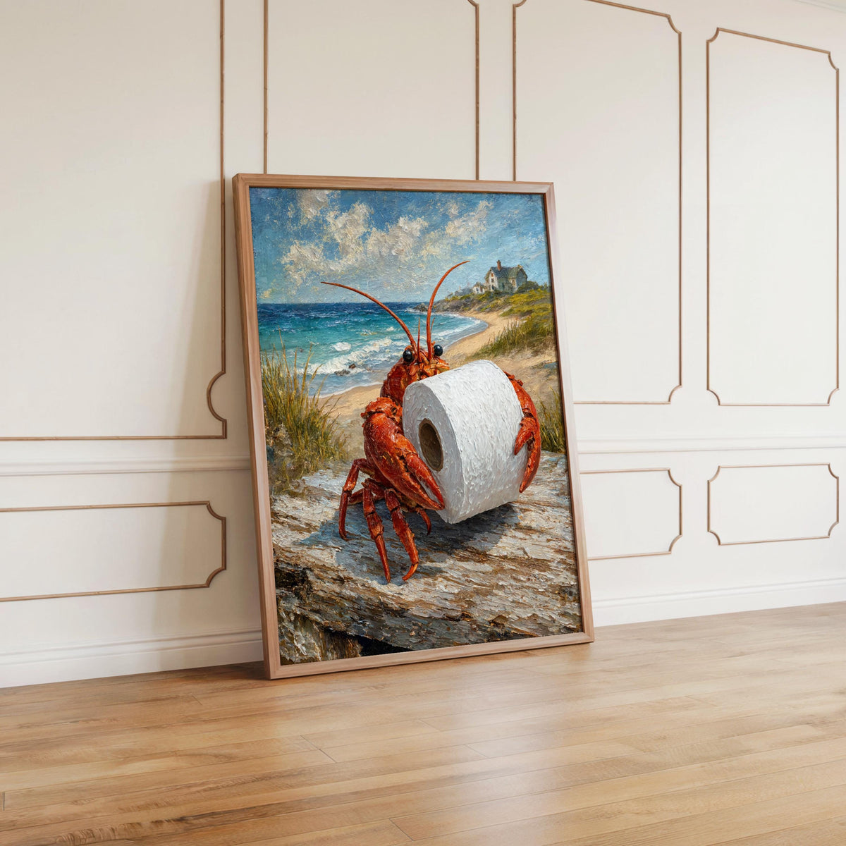 Leaning framed funny lobster bathroom print on wooden floor against paneled white wall, powder room art print vibe