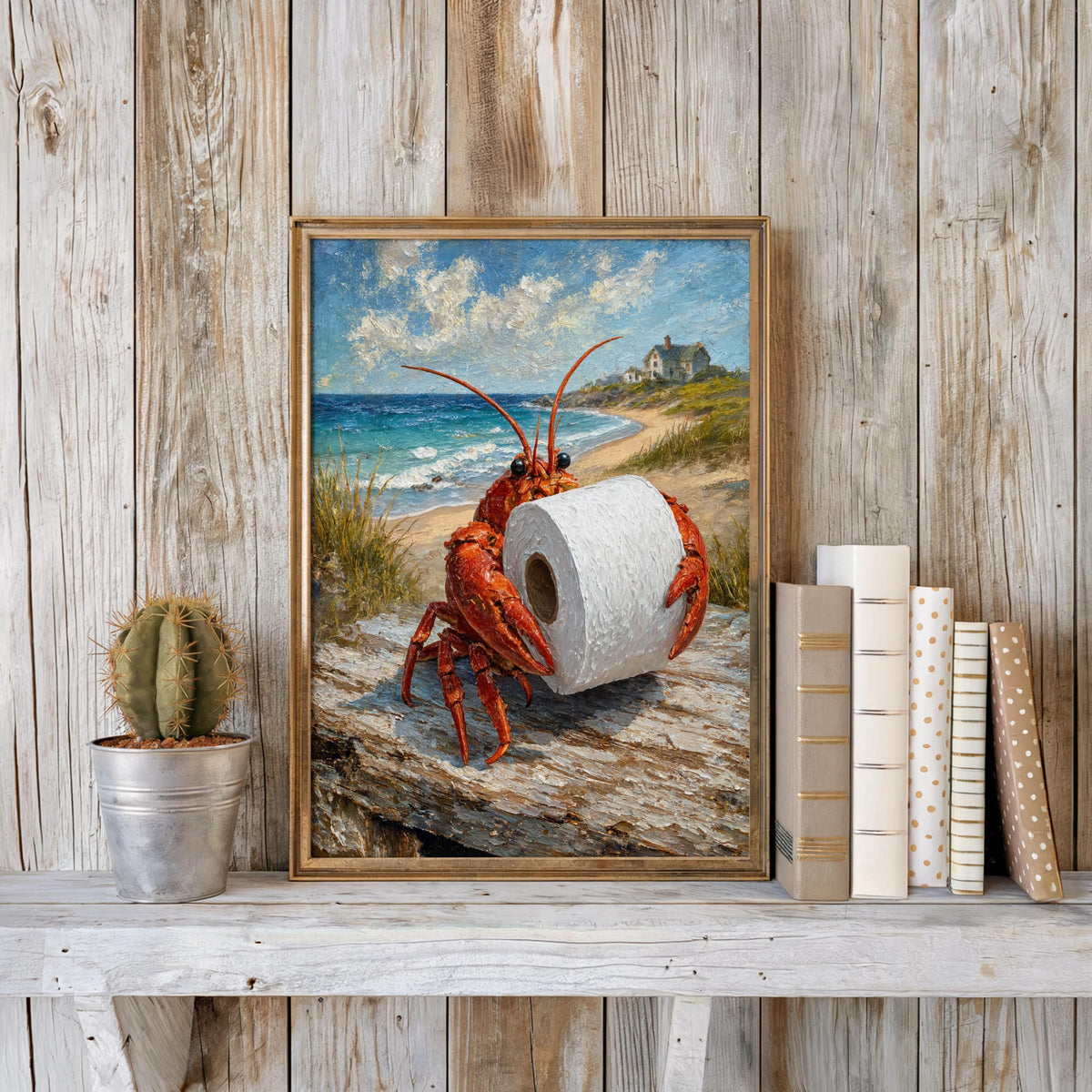 Rustic shiplap wall scene, framed funny lobster bathroom print on shelf with cactus and stacked books, coastal charm