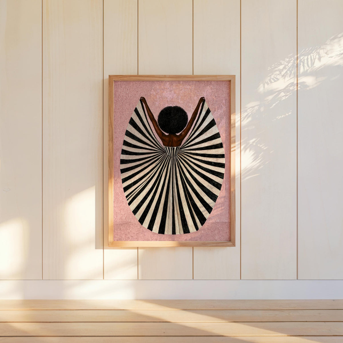 Blush pink artwork propped on shelf, soft palette with stark fan dress silhouette, afrocentric woman art print, abstract black woman wall art