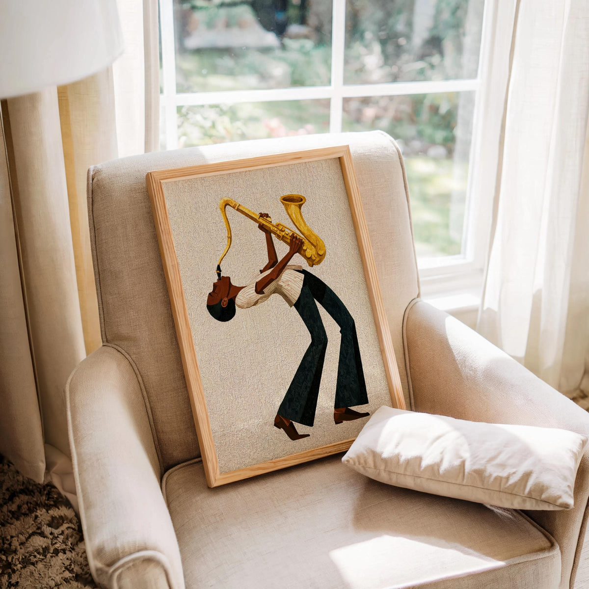 Afrocentric jazz wall art print resting on window chair, cream canvas texture, mid century modern jazz decor.