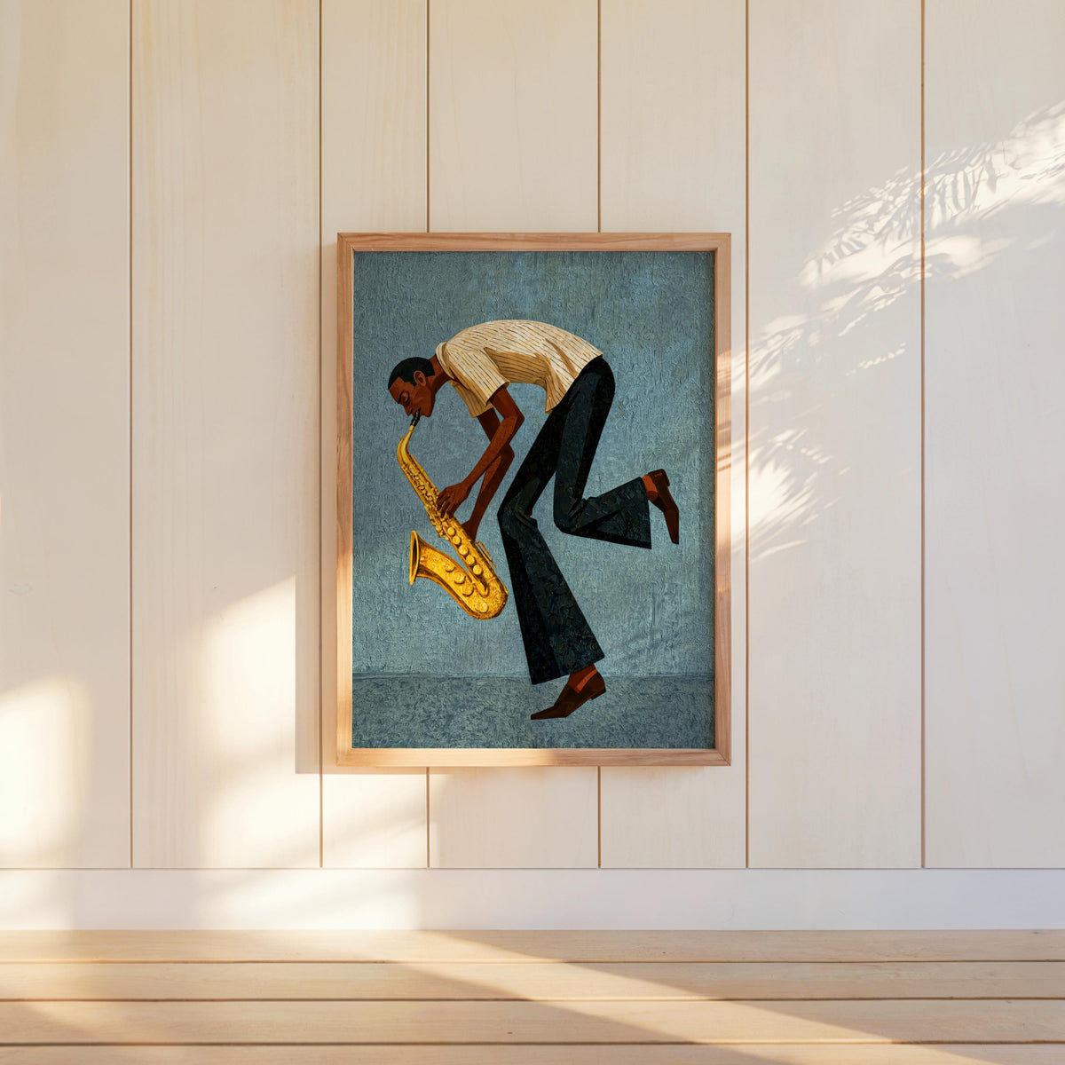 Framed blue mid century saxophone wall art centered on paneled wall, stylized saxophonist, calm jazz room decor