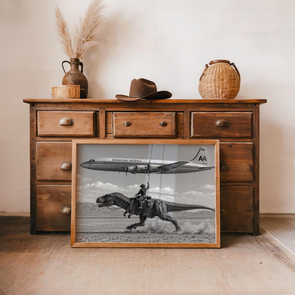 Vintage Cowboy Riding Dinosaur Poster, Retro Western Art Print, Surreal T-Rex in Desert, 1950s American Airlines Airplane Wall Decor
