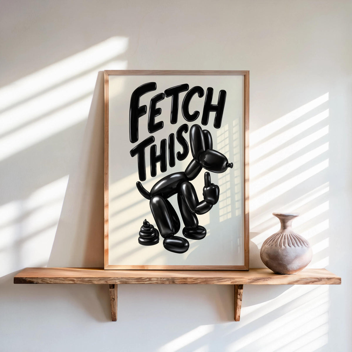 Sunny shelf vignette with ceramic vase, bold black balloon dog and FETCH THIS text, cheeky dog print meets quirky decor