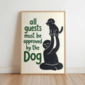 Framed black hand-drawn dog with green 'Dog' typography, leaned on wood floor, funny dog wall art with retro palette