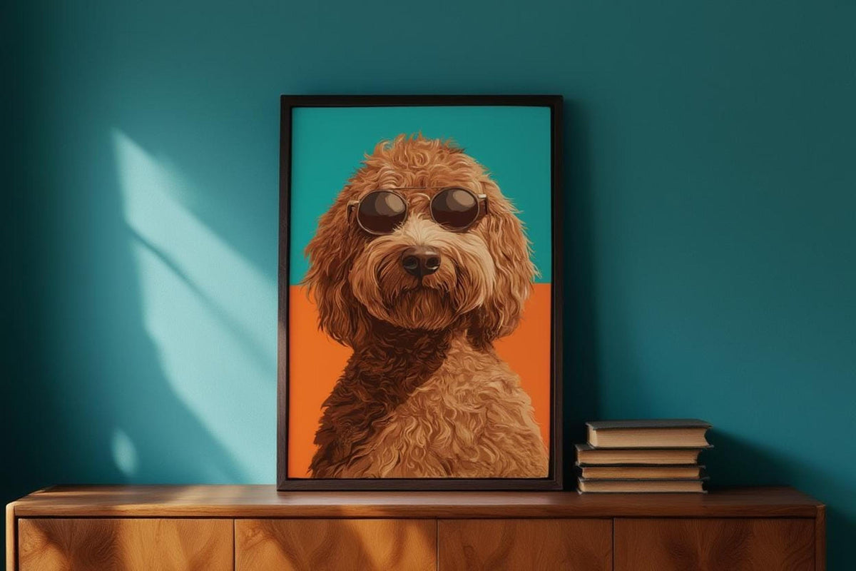 Framed modern pet wall art on a teal wall shelf, shaggy doodle portrait beside stacked books, graphic style.