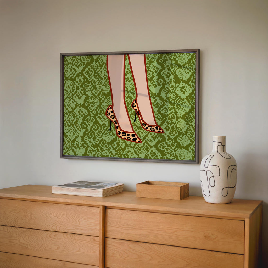 Wide framed leopard print heels wall art over wooden dresser, bold green snake texture, stylish feminine gift suggestion