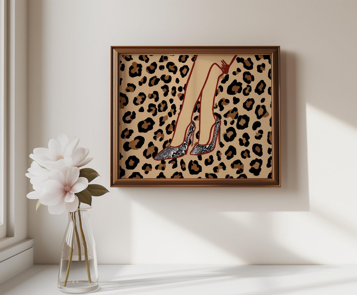 Small framed leopard print high heel wall art hung above vase, fashion illustration wall art touch