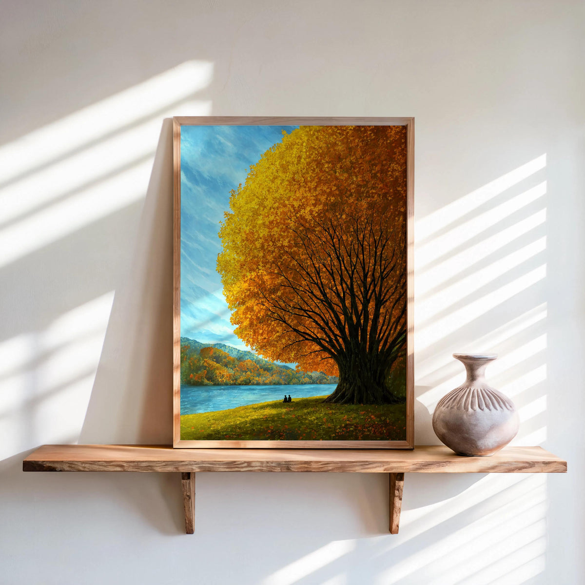 Autumn tree lake wall art on a sunlit floating shelf, fall lake wall decor with warm golden tree and distant mountains