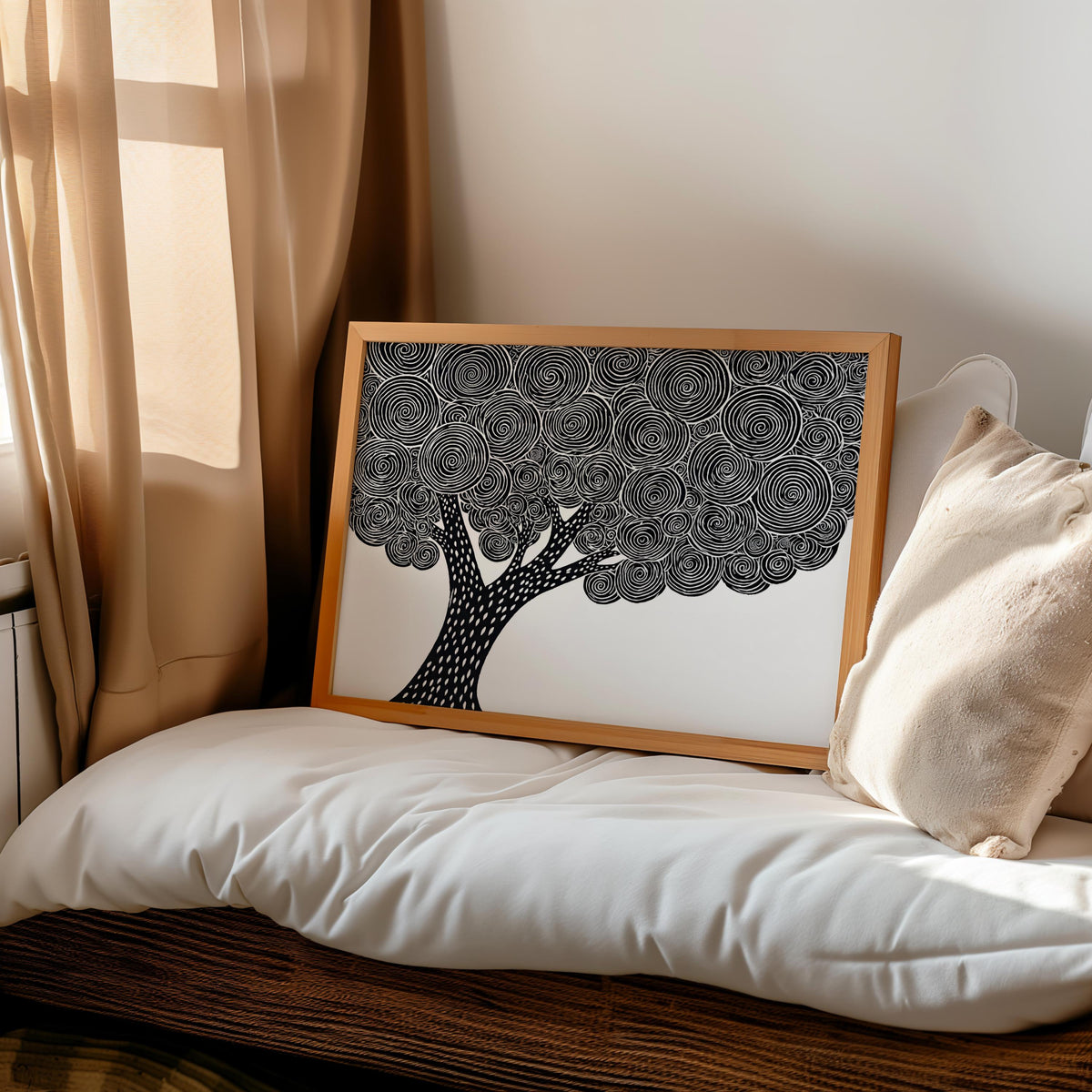Black and white tree wall art leaned on a bed bench, linocut tree print lending Japandi bedroom calm