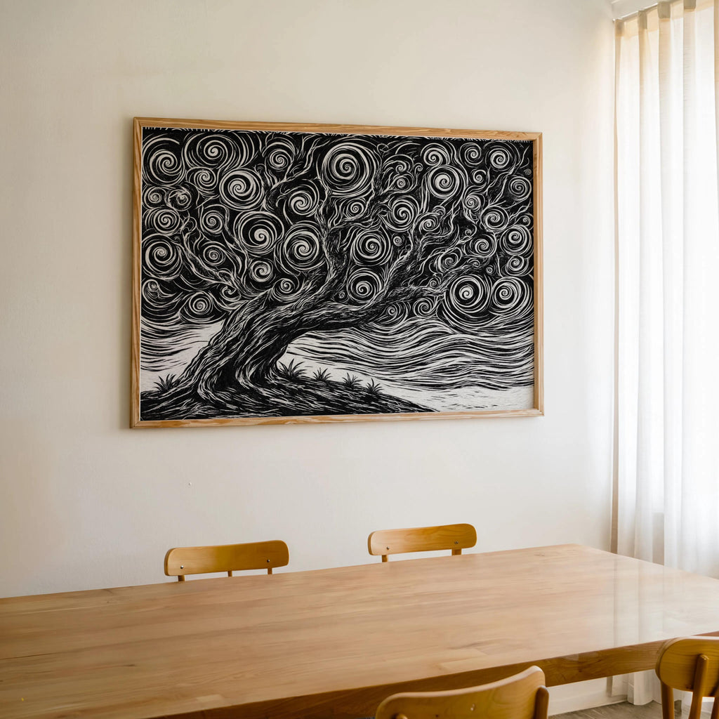 Black and white tree linocut print framed above a wooden dining table, minimalist tree art print pairing with warm wood tones