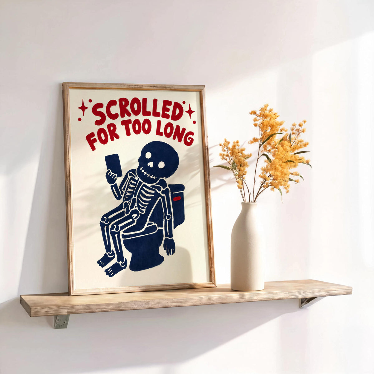 Funny skeleton bathroom art on a floating shelf with dried flowers, toilet humor decor print in warm light