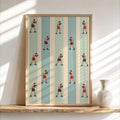 Framed vertical print leaning on a shelf, repeated boxer illustrations on muted striped field, vintage boxing wall art.