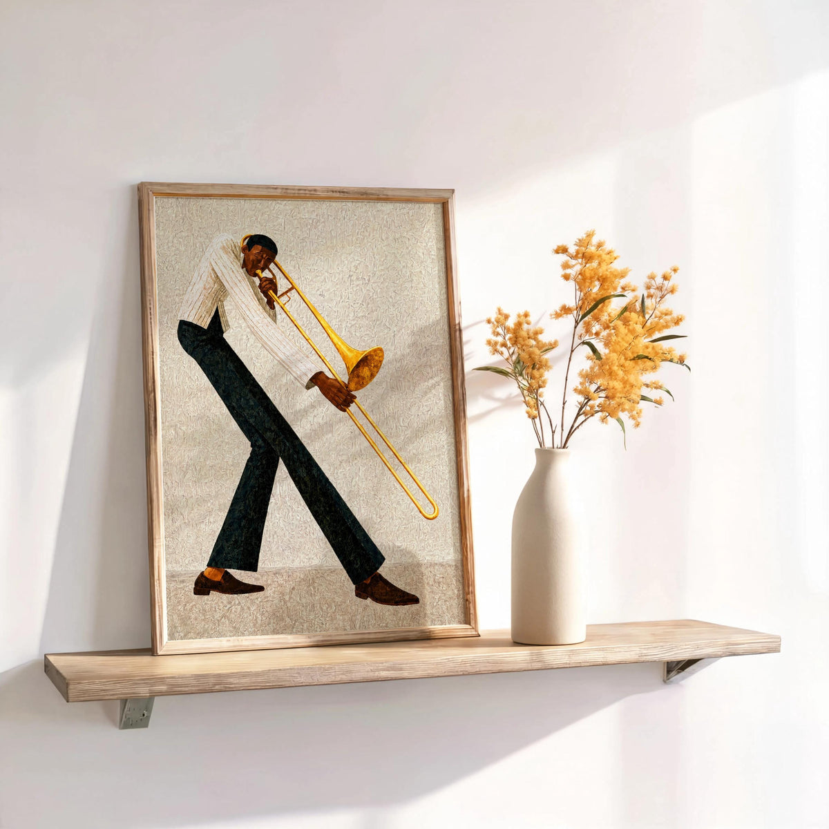 Jazz trombone wall art, neutral framed print on shelf with vase, retro music wall art and decor.